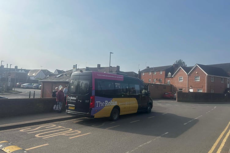 The Robin community bus drops visitors off at the Spring Fayre, providing a friendly and accessible transport option into Newent.