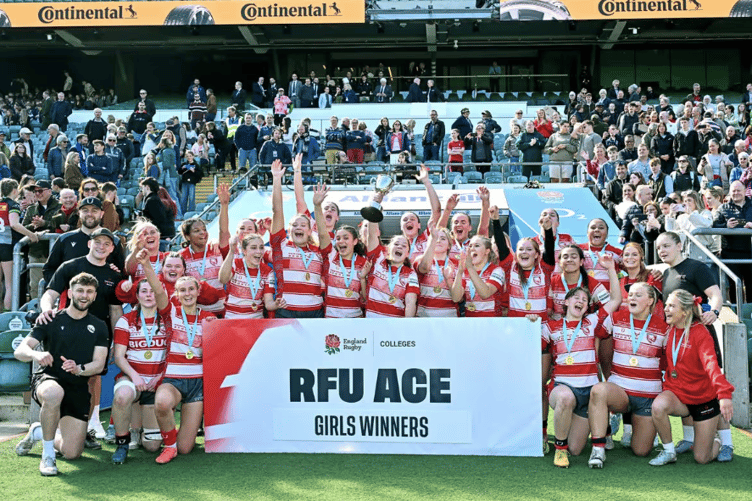 Hartpury College players lift the Continental Tyres Schools RFU ACE Girls trophy at Twickenham.