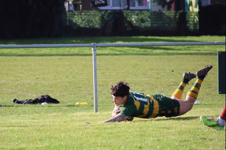 Fin Mellis scores for Newent. Picture: Georgina Gardner.