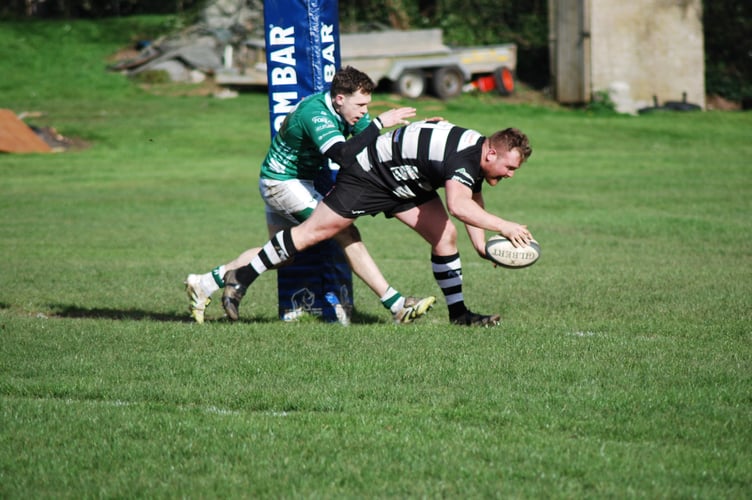 Rowan Mullis touches down for Lydney. Picture: Roger Pike.