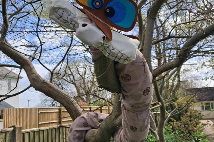 One of the longer creations wrapped around a tree.