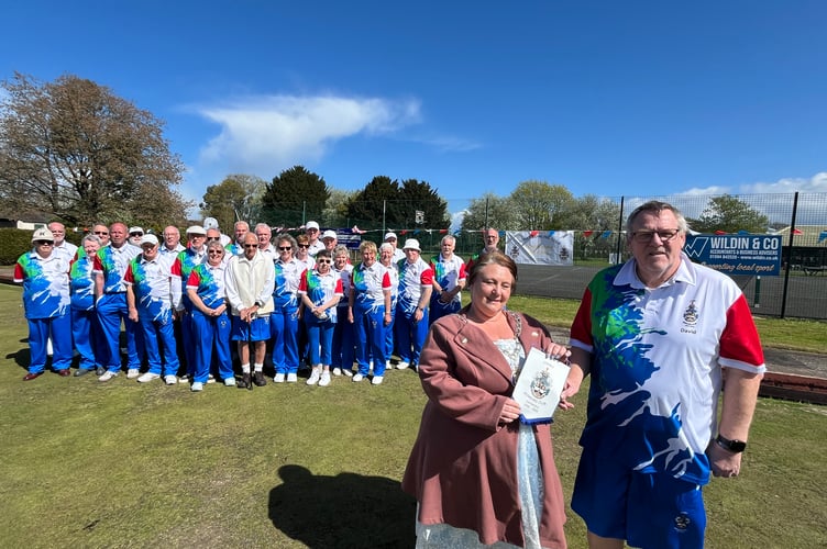 Club chairman David Deals presents a pennant to Mayor of Lydney Cllr Natasha Saunders.