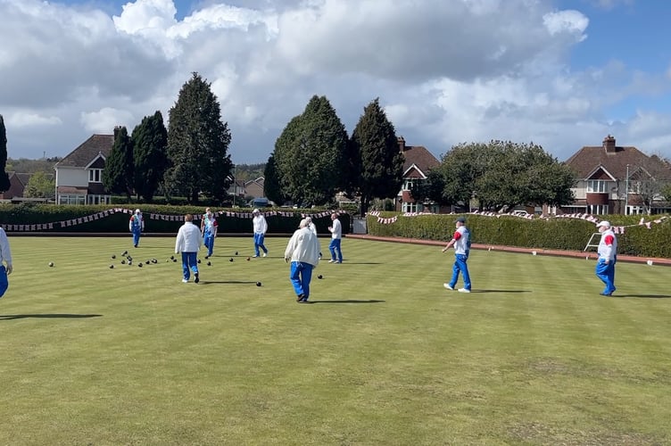 Players collect their bowls after the opening "spider" which involved many bowlers at the same time.