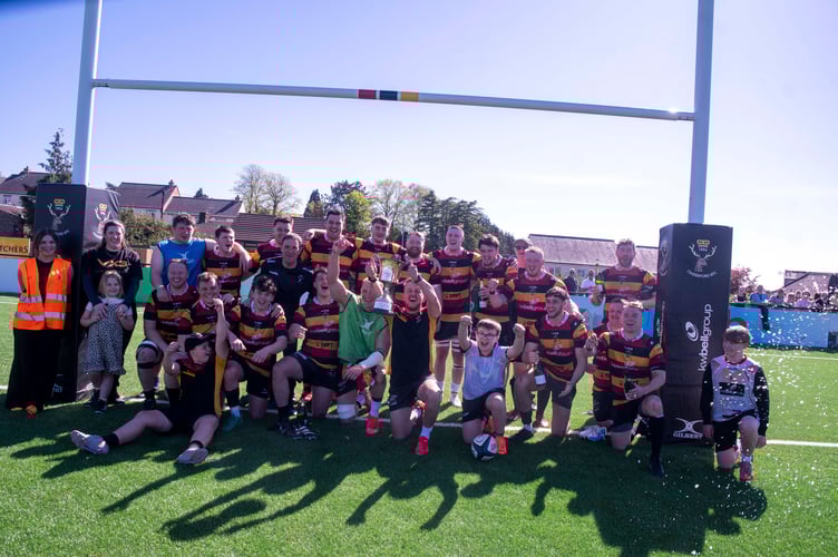 Champions Cinderford Utd celebrate promotion