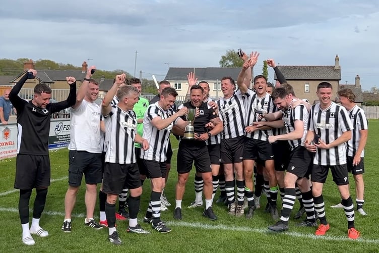 Staunton & Corse Reserves celebrate winning the George Sandoe Cup