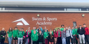 Two Rivers Housing donates £790 to swimming club
