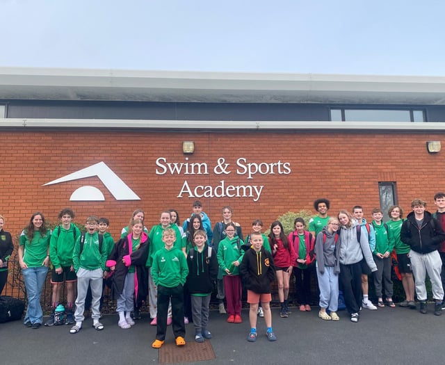 Two Rivers Housing donates £790 to swimming club