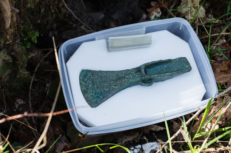 Close-up view of the Bronze Age palstave axe head, showing its preserved blade and surface detail following conservation work.