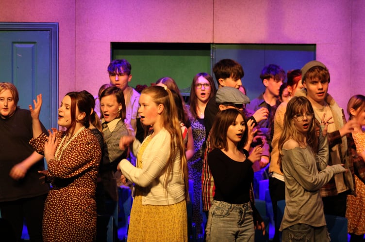 The Little Shop of Horrors ensemble.