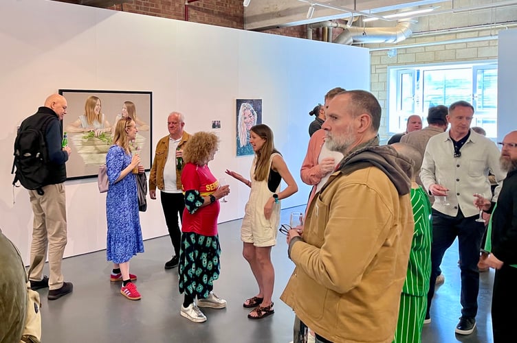 Guests at the portrait unveiling
