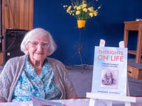  Marjorie puts "Thoughts" into book at age 103