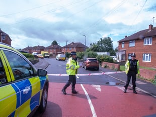 Men held under Mental Health Act following death of woman
