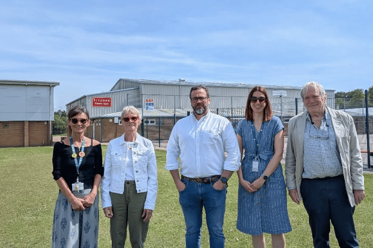 Representatives from Forest of Dean District Council visit Forest of Dean Gymnastics and Fitness in Berry Hill following the installation of new solar panels funded through a £20,000 Community Asset Grant.