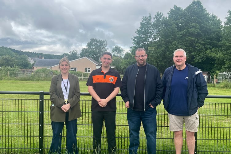 Cllr Emma Walker of Cinderford Town Council,
Jordan Davis, Chairman, Rank Outsiders FC
Forest MP Matt Bishop and Cinderford Town Youth under-10s girls coach Edward Sheppard at Steam Mills Recreation Ground.