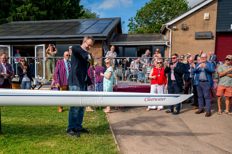 Haigh Environmental Director Luke Shepherd christens the new Ross RC boat Clearwater