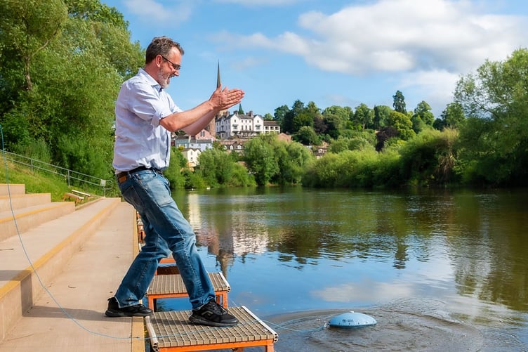 Luke Shepherd releases the monitoring buoy