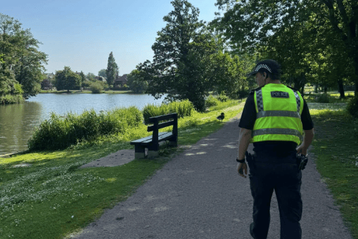 A neighbourhood police officer out on patrol during community engagement visits across the north of the Forest of Dean this week.