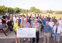Footballers pass air ambulance landmark