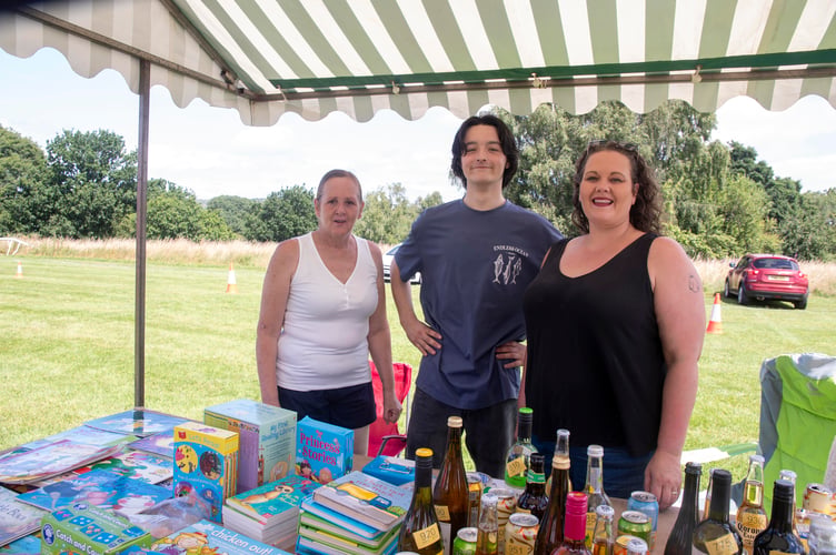 Donna Barnes, George Woodley and Sarah Williams on the Woolaston Under-Fives stall.