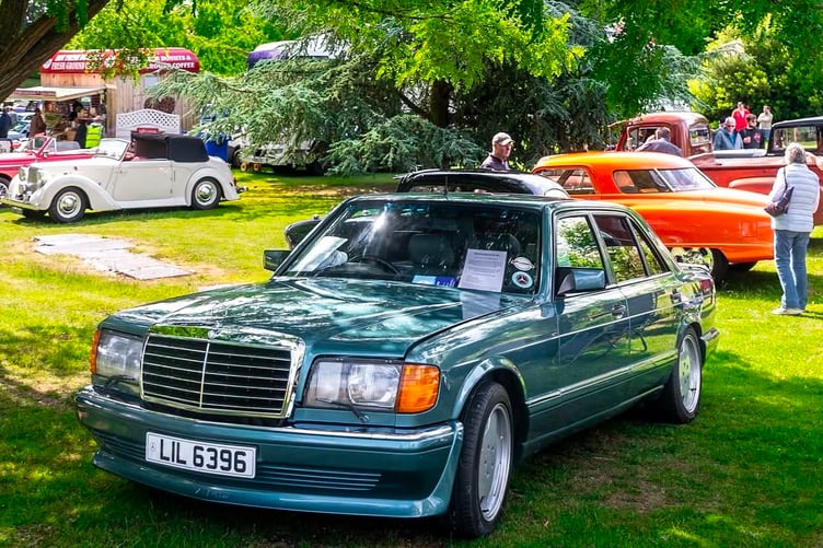 A well-preserved Mercedes-Benz W126 on display among more than 300 classic and vintage vehicles at Highnam Court.