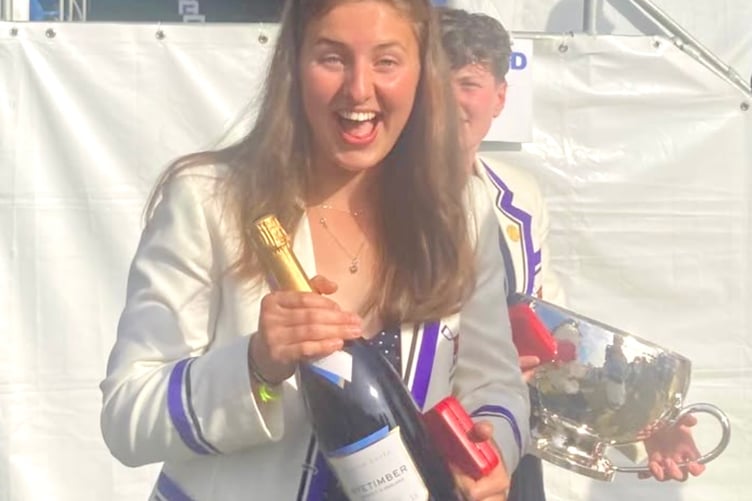Lovely bubbly - Fliss with her bottle of fizz after winning at Henley