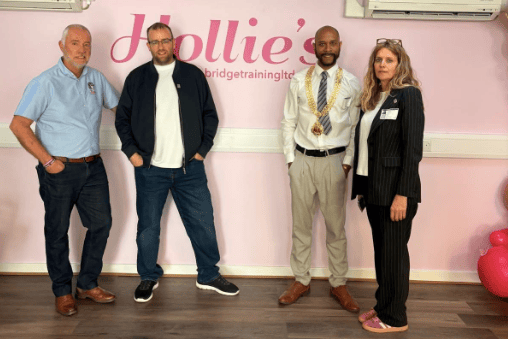 Matt Bishop MP joins representatives from the Hollie Gazzard Trust, Bridge Training Ltd, students and guests at the official opening of the new Hollie's training salon in Gloucester on Friday, July 3.
