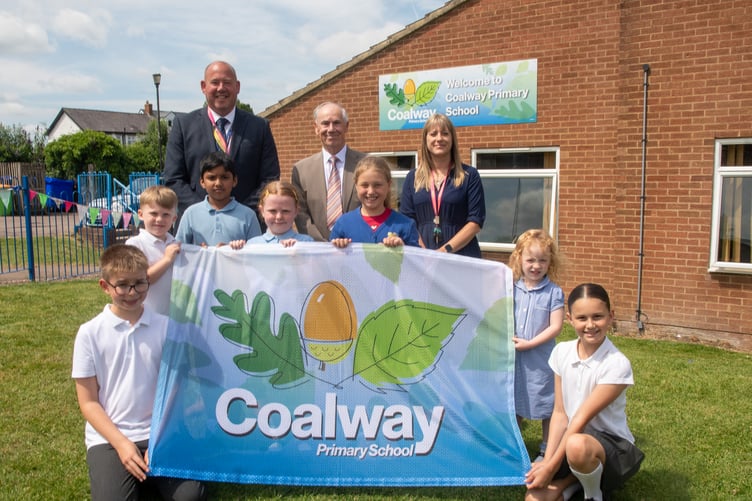 Head James Barrow, Chair of Governors Stuart McLester, Deputy Head Nicola Dixon with the children who helped conduct the official opening.