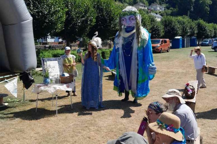 The Goddess of the Wye entered the riverside Millennium alongside Lady Wye and their entourage