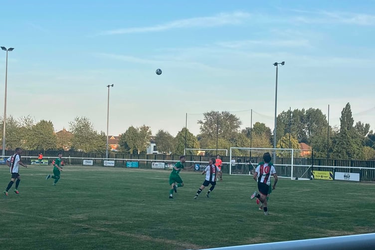 Lydney Town and Slimbridge in pre-season action on a warm evening at Sansom Park.