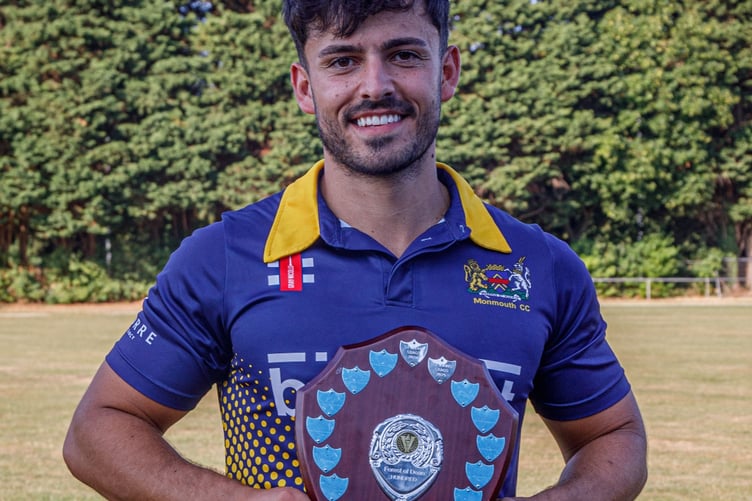 Monmouth captain Ben Pilot celebrates winning the Forest of Dean Hundred League Championship final.