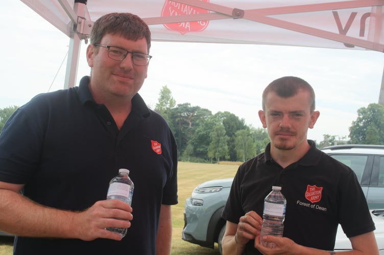 Rob Green and Steve Davis of the Forest Salvation Army were giving out bottles of water.