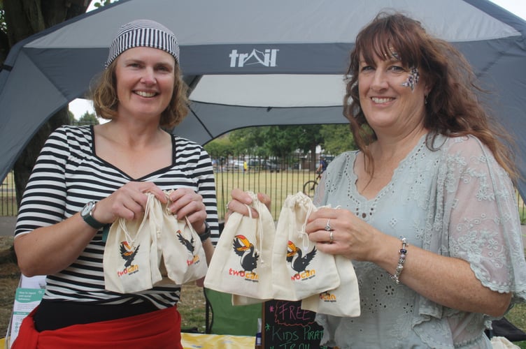 Leanne Bufffin and Anthea Tawney of Two Rivers Housing  with prizes for a pirate-themed treasure hunt.