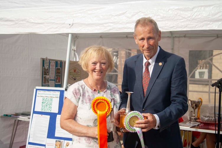 Jean Hoar won two trophies for flower arranging.
