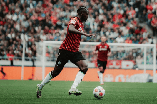 Former Hartpury College footballer Mustapha Bundu has returned to individual training with German side Hannover 96 as he recovers from a muscular injury.