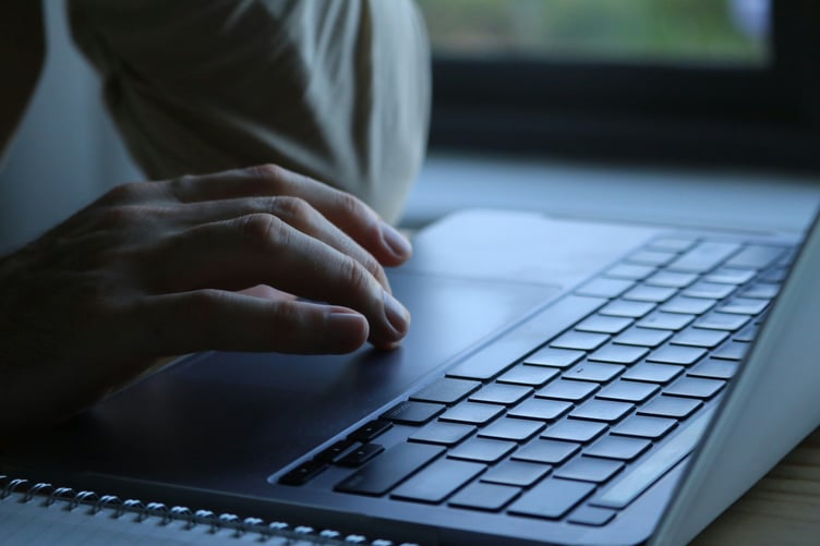 Using laptop stock image