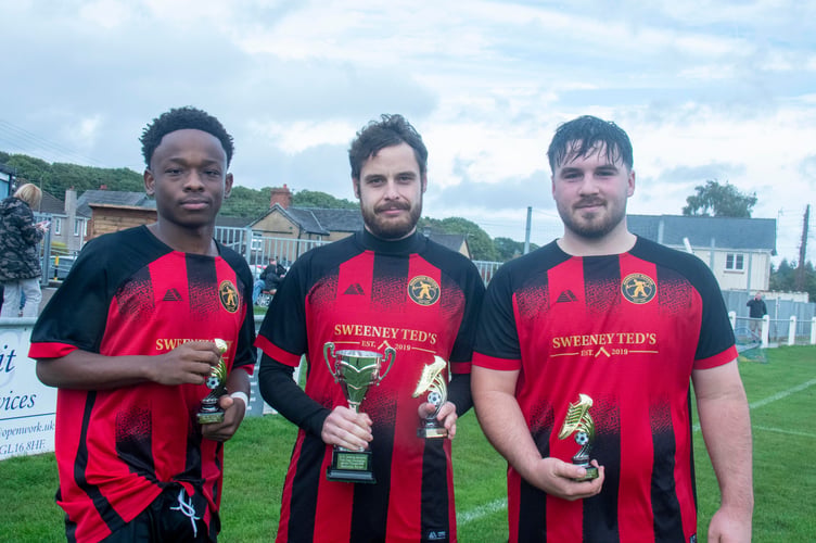 Redbrook goal scorers Jayden Makondora, Joe Reeves and Cai Dorrington with the West Dean Charities Cup.