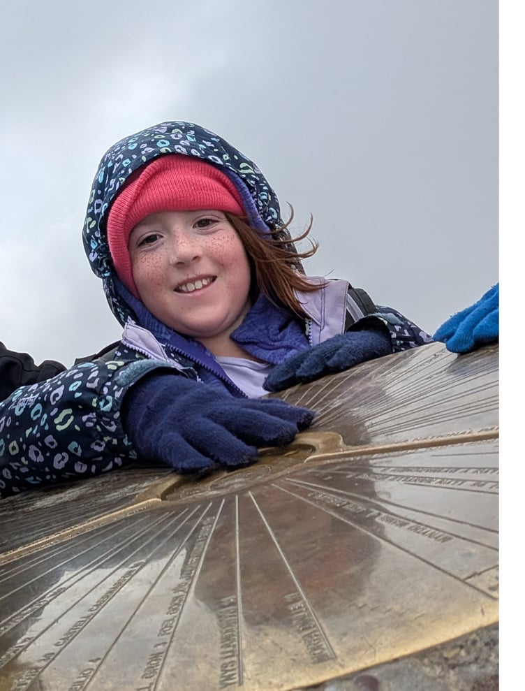 Betsy Butler at the summit of Snowdon.