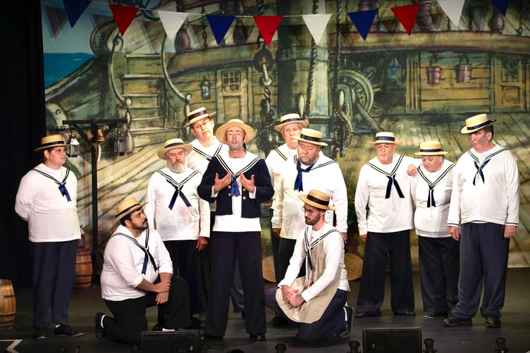 The ship's crew pull together in HMS Pinafore