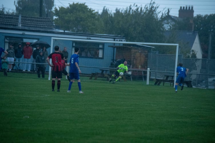 Soudley keeper Andrew Fawke saves a penalty