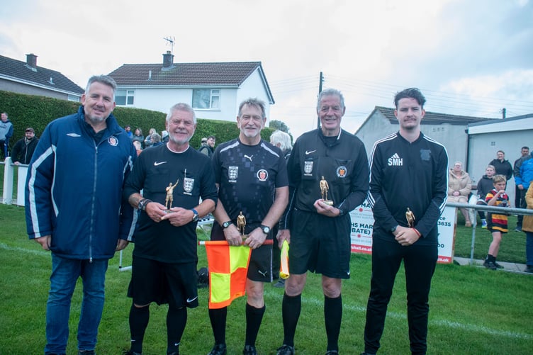 Adie Shilston (eft) ppresented medal to referee Paul Tucker, linesmen Terry O'Nions and Mike Thomas and fourrth official Shane Howells