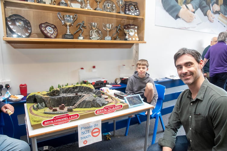 Author of the Forest Railway series of childrenâ's books Matt Crossfield with Charlie Barnley who created the layout with his grandad.