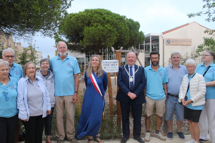 The Mayors of St Hilaire and Coleford, Kathia Viel and Nick Penny, with councillors and members of the twinning associations at the official opening.