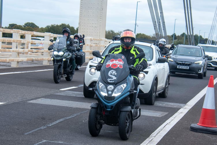 A Motorbike Owners Gloucestershire trike with a Poppy Appeal logo.