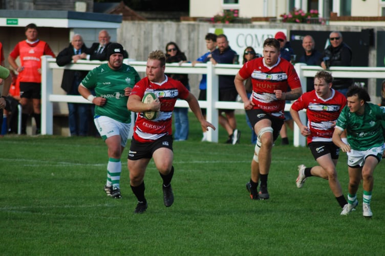 Lydney's Rowan Mullis carried the ball forward during his side's impressive 35-22 victory away at Sidmouth, securing their first league win of the season.