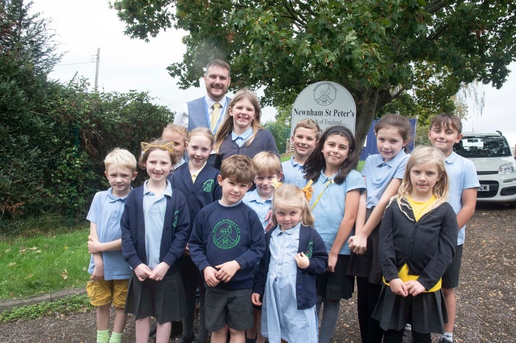 Pupils of Newnham School celebrate the Ofsted report with headteacher Mr Joe Childs