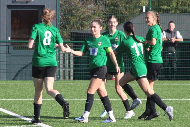 Juniors celebrate a goal at Hereford Pegasus