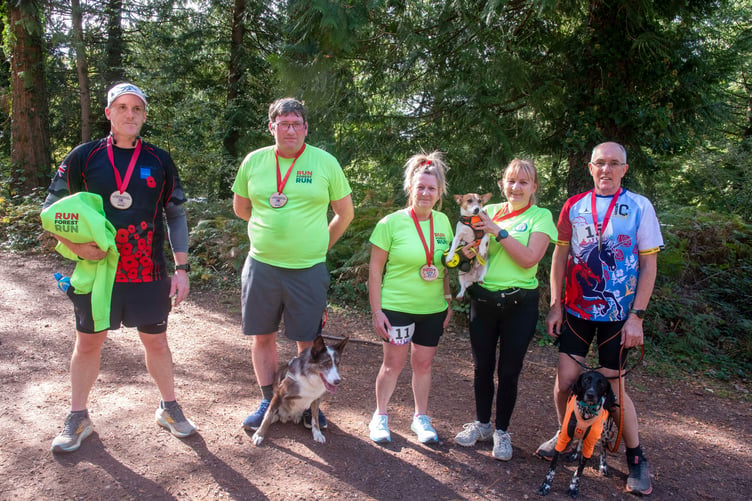 Dan Mustoe, Robert Green with Spencer, Trish Bevan, Sue Nash with Diesel and Steve White of the Cinderford-based club Run Forest Run.