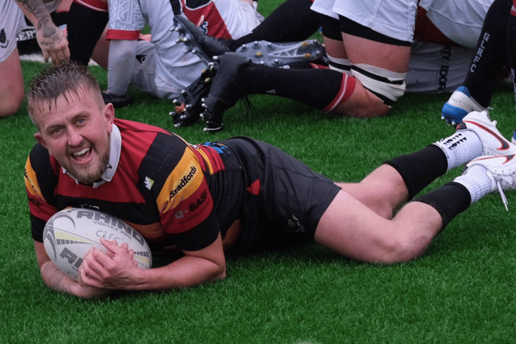 Dan Nicholls celebrates scoring for Cinderford United in their 25-16 victory over Gordon League.